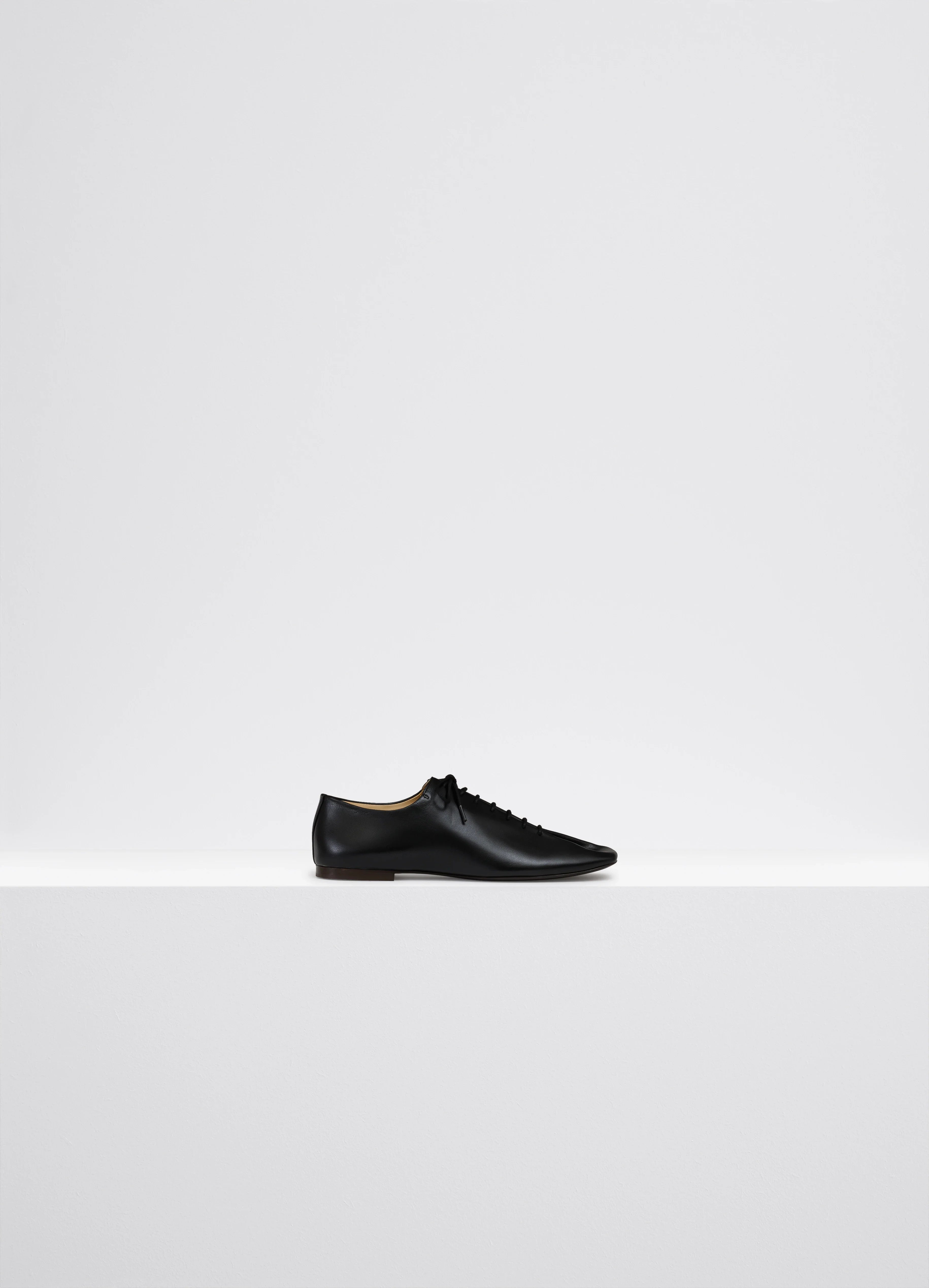 BLACK Flat piped slippers | LEMAIRE