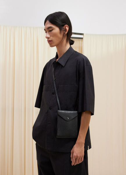 Envelope Clutch with Shoulder Strap in Black | LEMAIRE